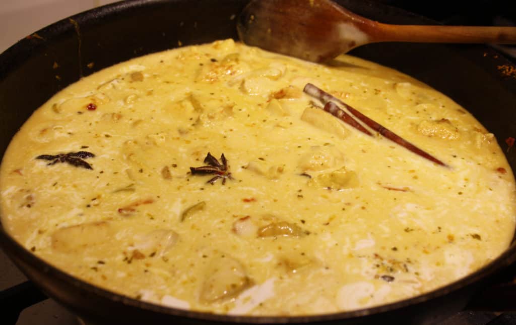 curry simmering in a pan
