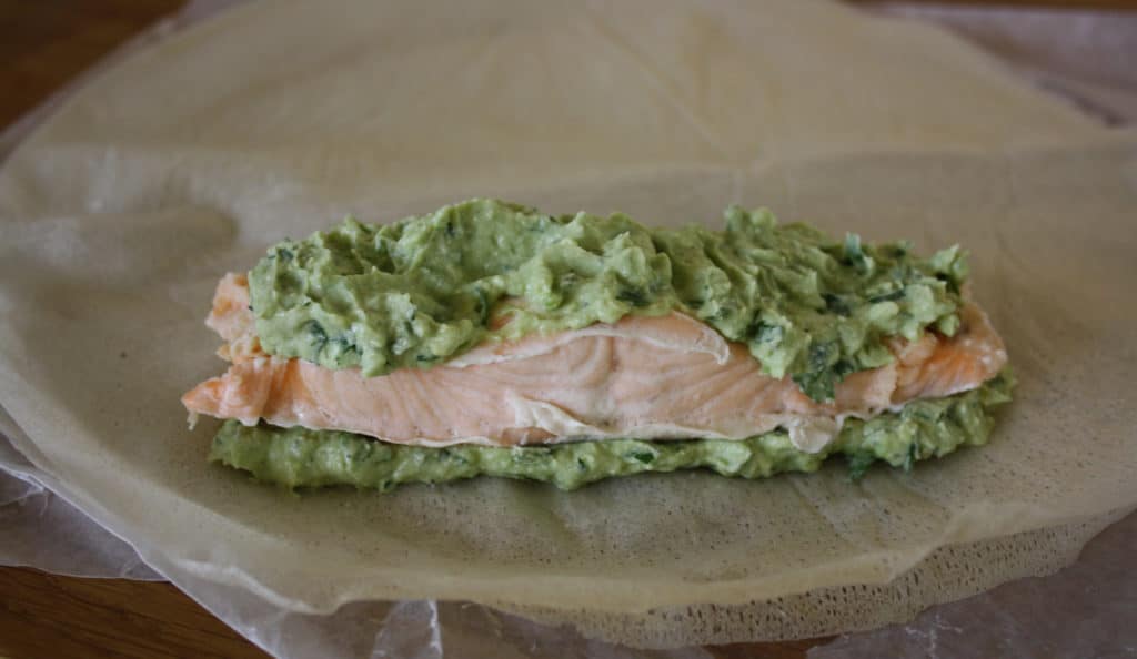 Salmon and Avocado Parcels. Lightly steamed salmon smeared with mashed avocado and coriander and then rolled up in Brik pastry and baked in the oven. 