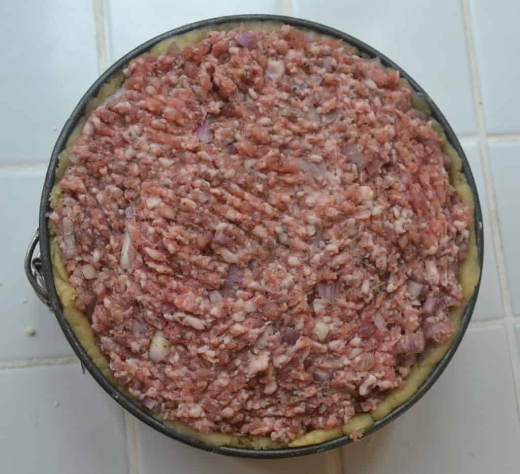 second layer of sausage meat added.