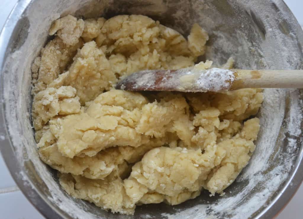 flour and lard  mixed together in a bowl.