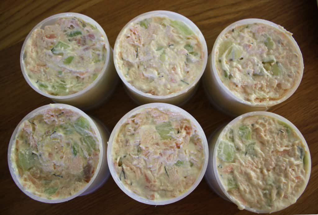 These summer salmon timbales are light and delicate. Smoked and lightly cooked salmon with cucumber and avocado in a creamy dill and lemon dressing.