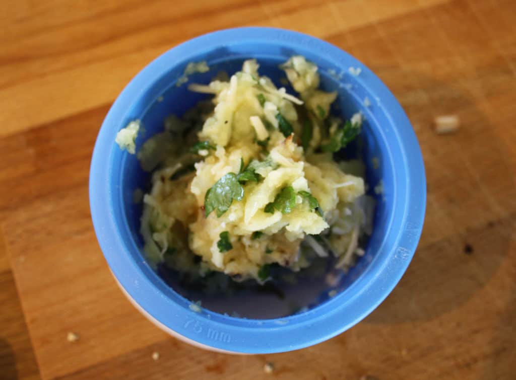 A quick side dish of cheese and onion potato cakes using leftover baked potatoes with parsley or coriander.