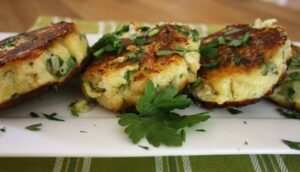 A quick side dish of cheese and onion potato cakes using leftover baked potatoes with parsley or coriander.