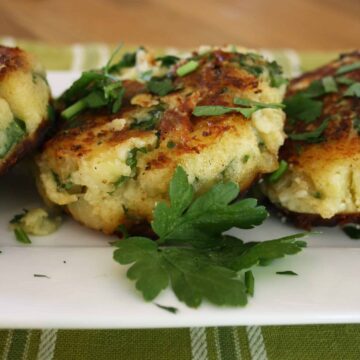 A quick side dish of cheese and onion potato cakes using leftover baked potatoes with parsley or coriander.