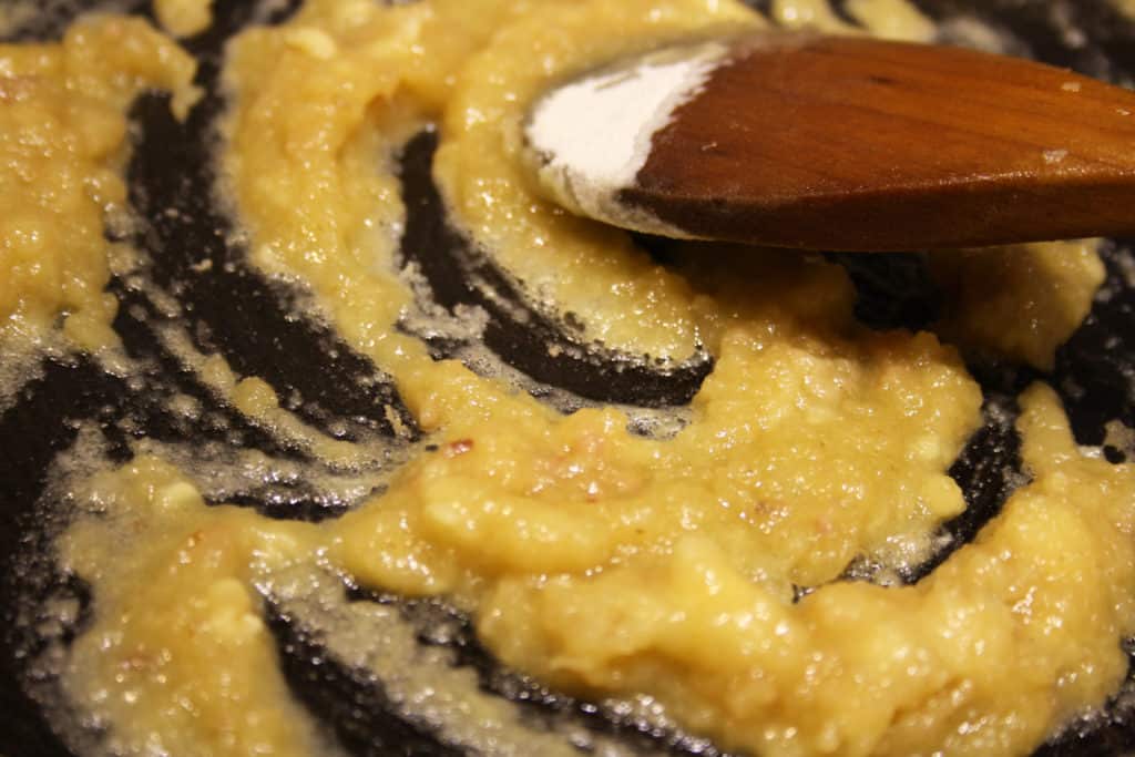 flour and butter cooking together in a pan.