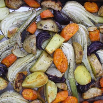 Roasted Winter Vegetables. Here's a wicked mix of garlic, fennel, potatoes, onions, apples and carrots for an easy and tasty accompaniment to roast pork.