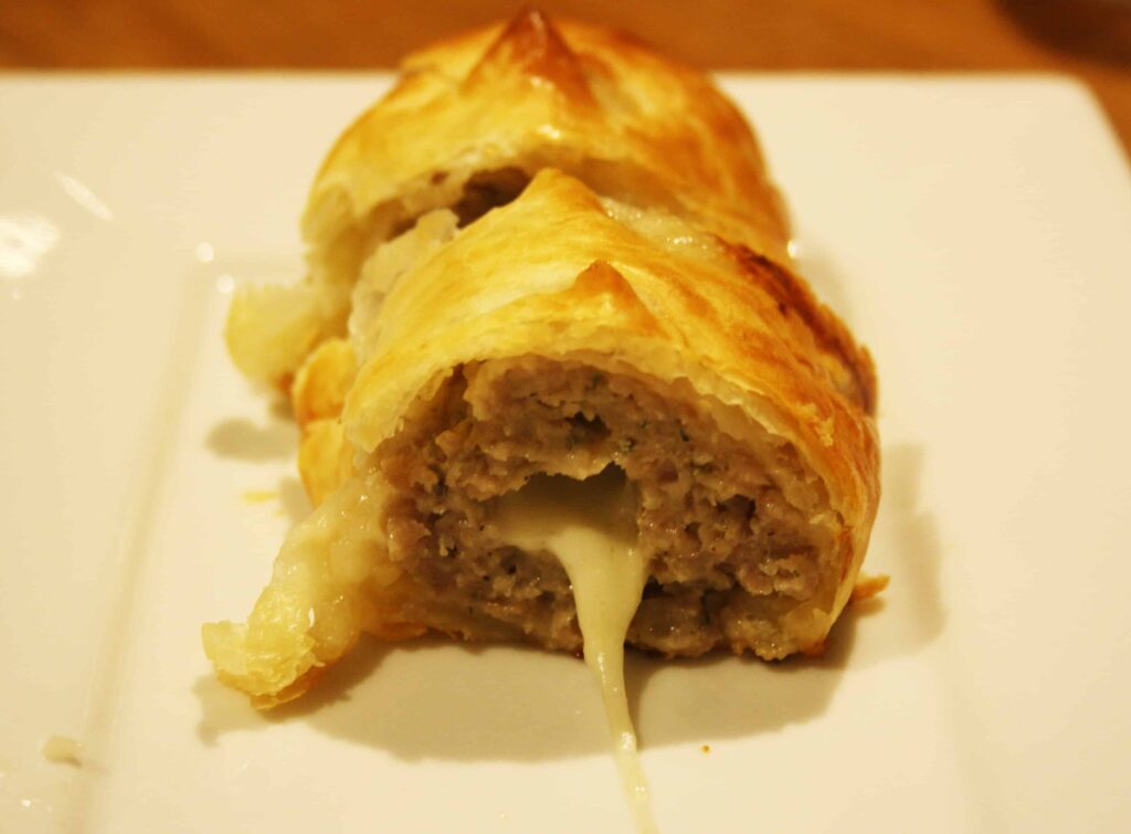 Mozzarella Sausage Rolls. Known here as Mooing Pigs, these naughty morsels are stuffed with mozzarella and when you cut them the mozzarella oozes out.