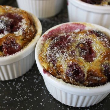 Cherry Clafoutis. A classic French dessert of fresh cherries baked in a buttery batter and best served warm.