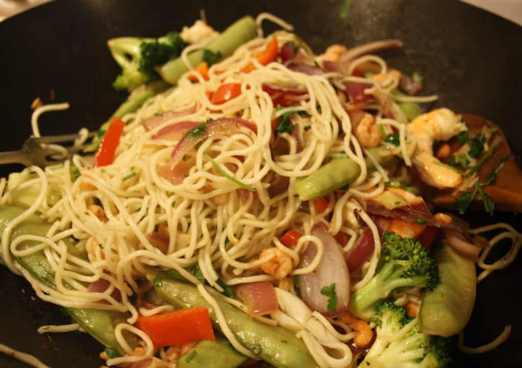 wok with noodles added.