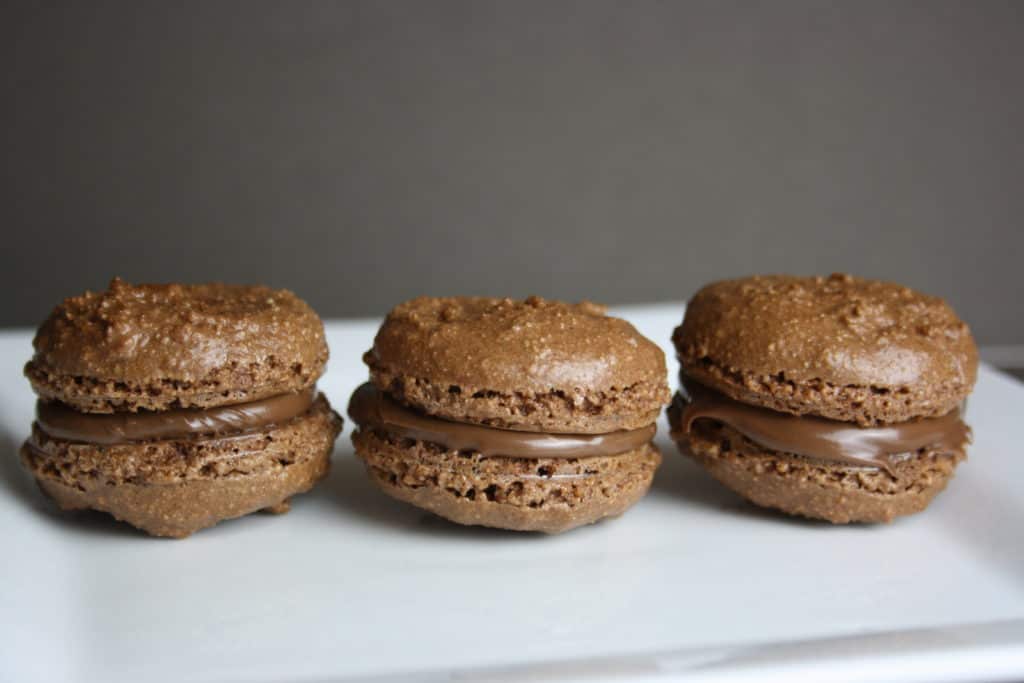 nutella macarons on a plate.