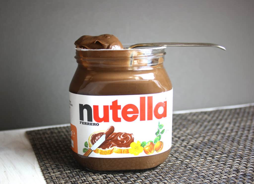 jar of nutella with a spoon in it