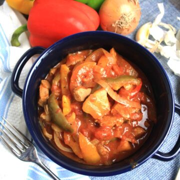 Slow Cooked Paprika Pork. Tasty pork shoulder stewed with peppers, onions and pineapple in a smoked paprika tomato sauce.