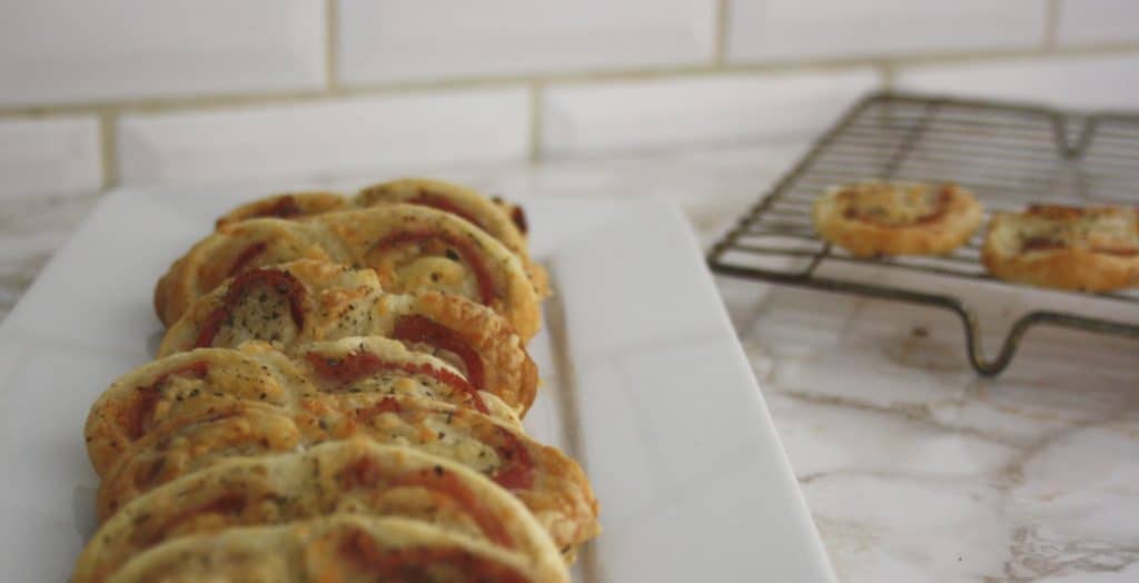 Ham and Cheese Palmiers. These deliciously crisp French biscuits are simple to do and perfect to serve to guests with drinks.