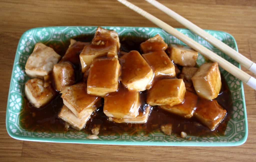 Sesame Garlic Tofu is a vegetarian dish that is packed full of flavour and cooked in under 10 minutes for a delicious and satisfying meal.