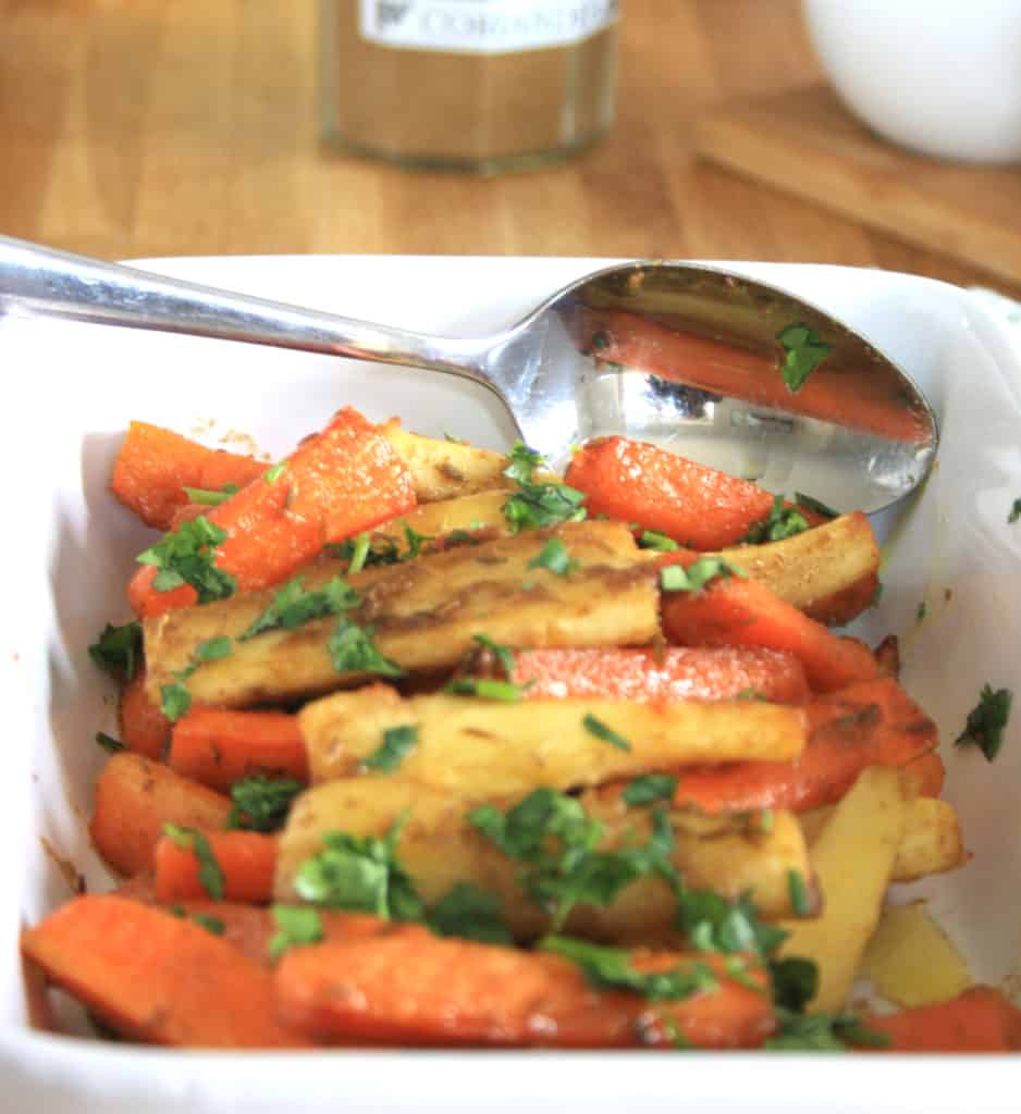 Coriander and Cumin Roasted Root Vegetables. Carrots and Parsnips roasted with butter, maple syrup, coriander and cumin seeds for a delicious side dish.