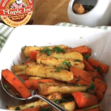 Coriander and Cumin Roasted Root Vegetables. Carrots and Parsnips roasted with butter, maple syrup, coriander and cumin seeds for a delicious side dish.