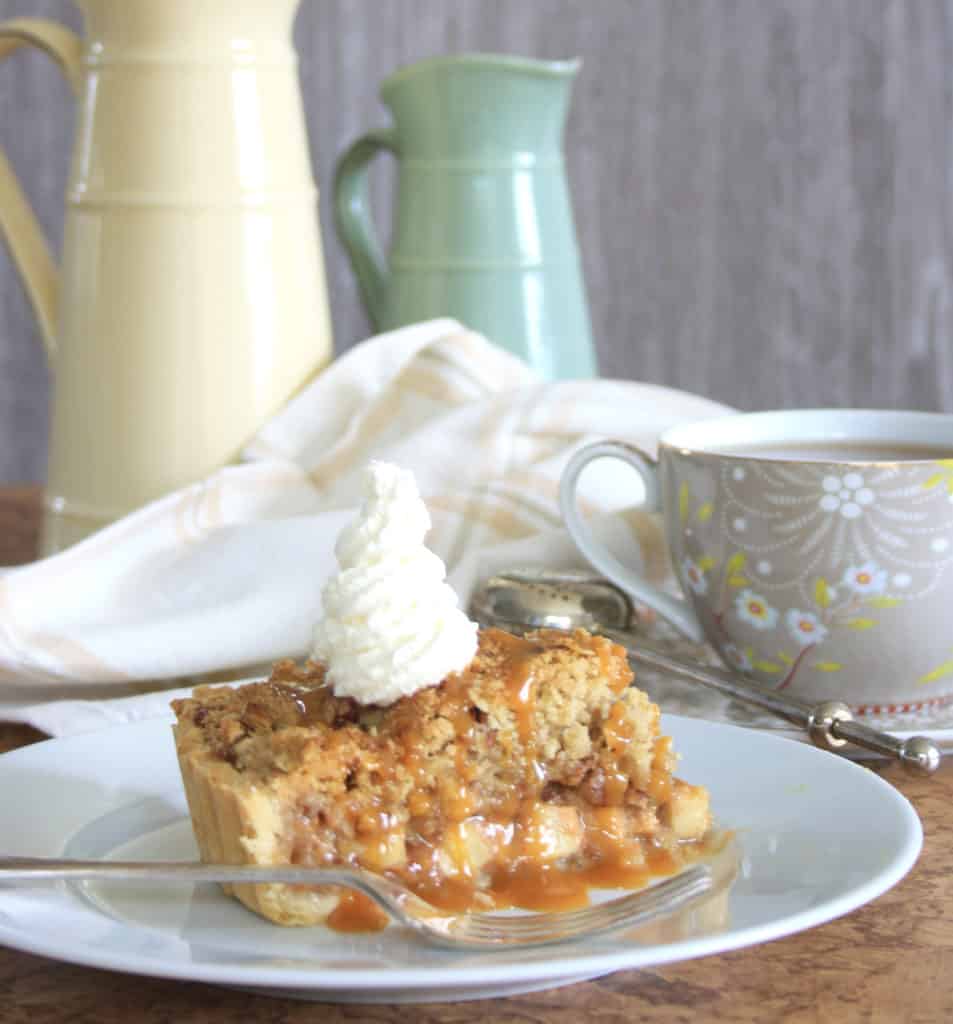 close up picture of apple and caramel  tart.