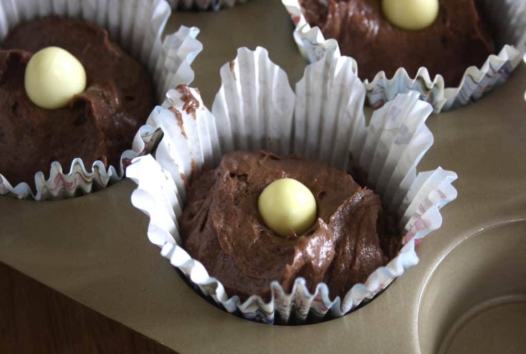 close up of easter chocolate cake with mini egg inside