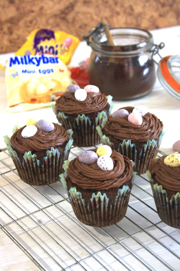 5 surprise easter egg cakes on a rack