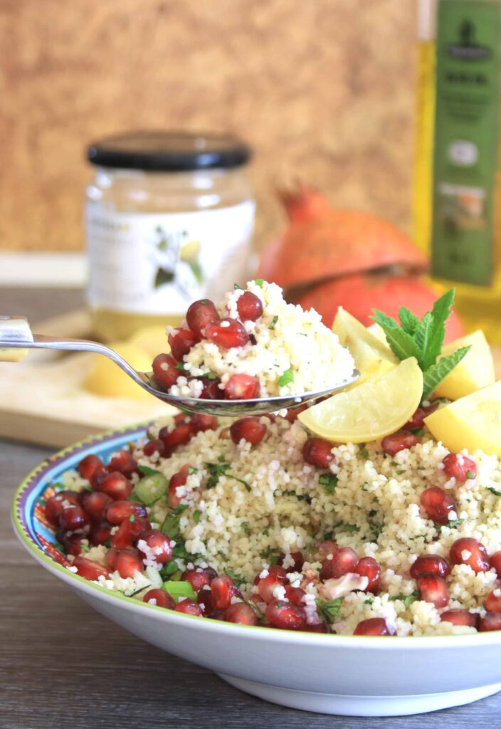 spoonful of pomegranate pistachio couscous salad