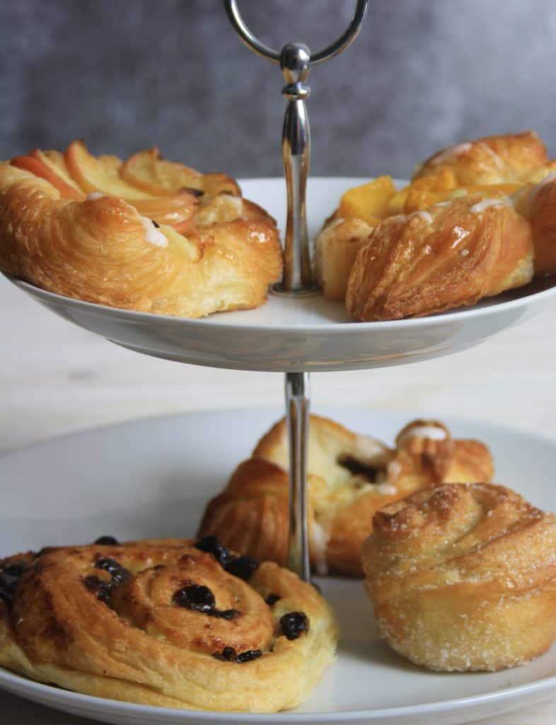 array of pastries on a two tier plate