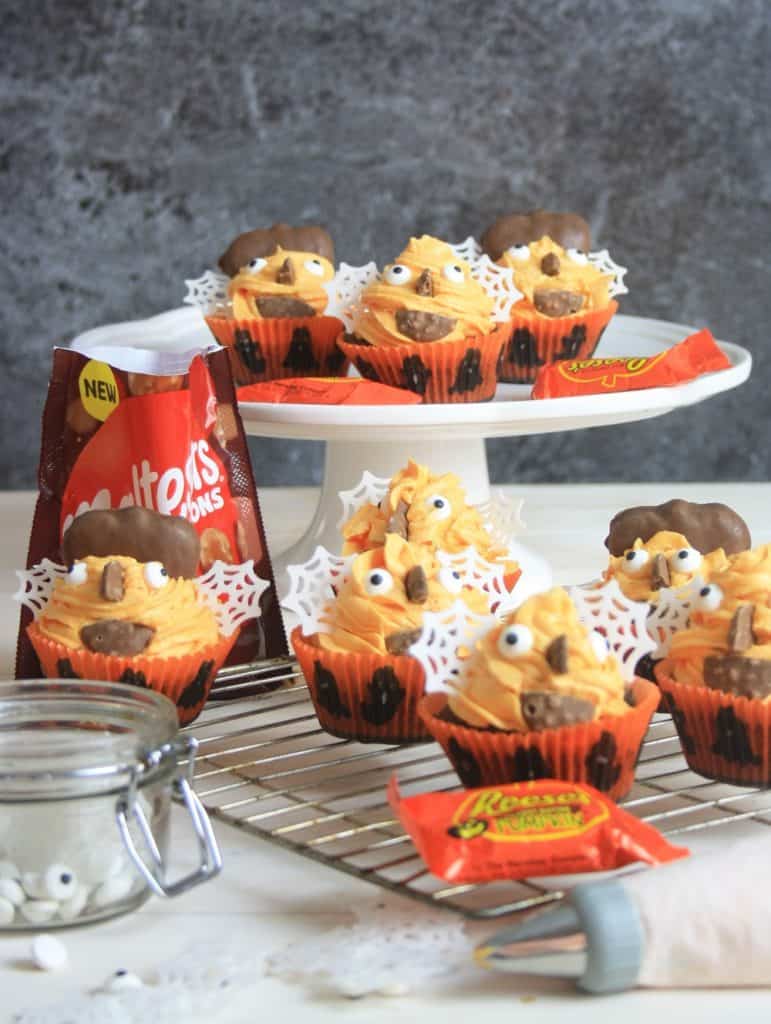 collection of halloween cupcakes on a plate