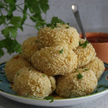pile of risotto balls on a plate