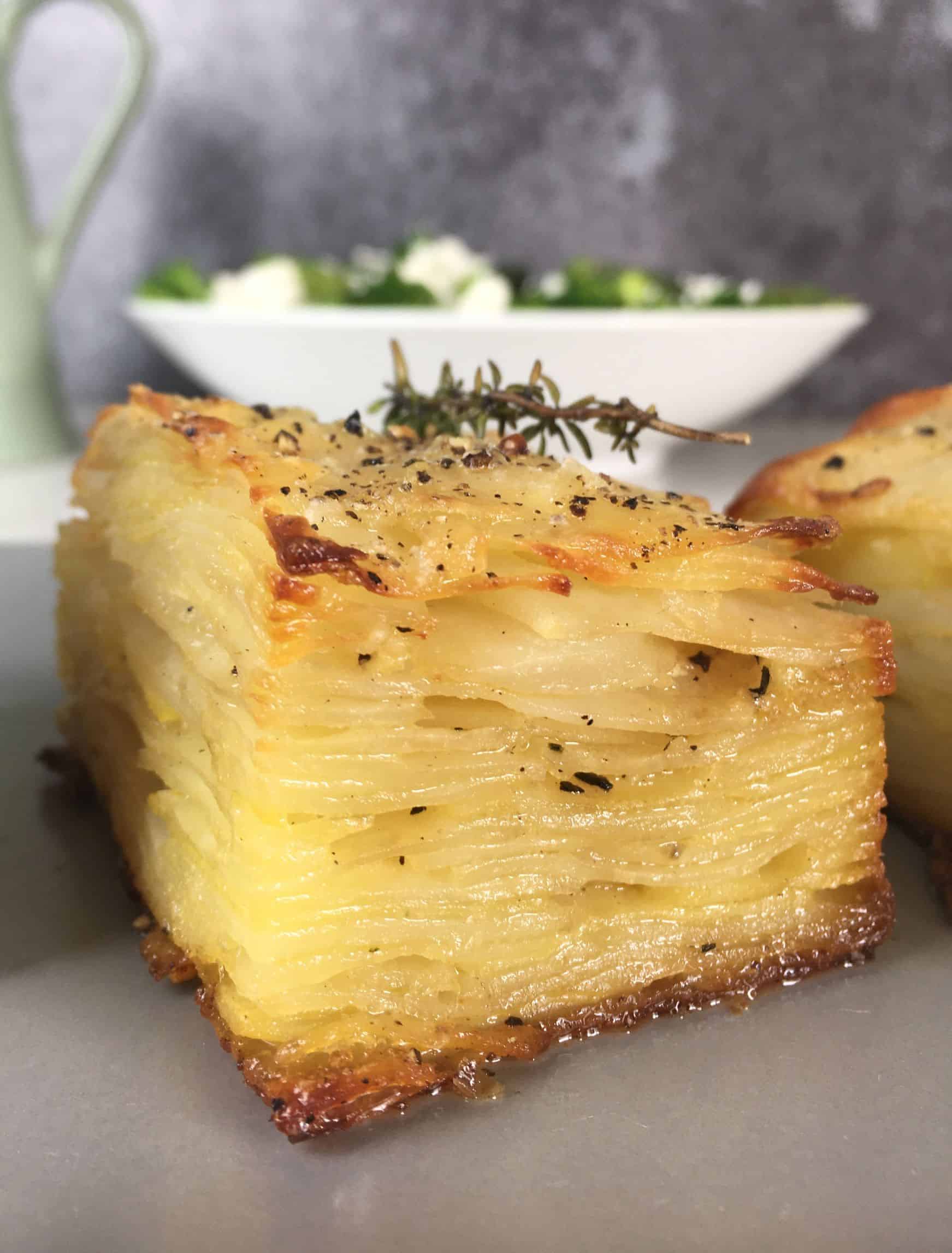 close shot of layers in scalloped potatoes