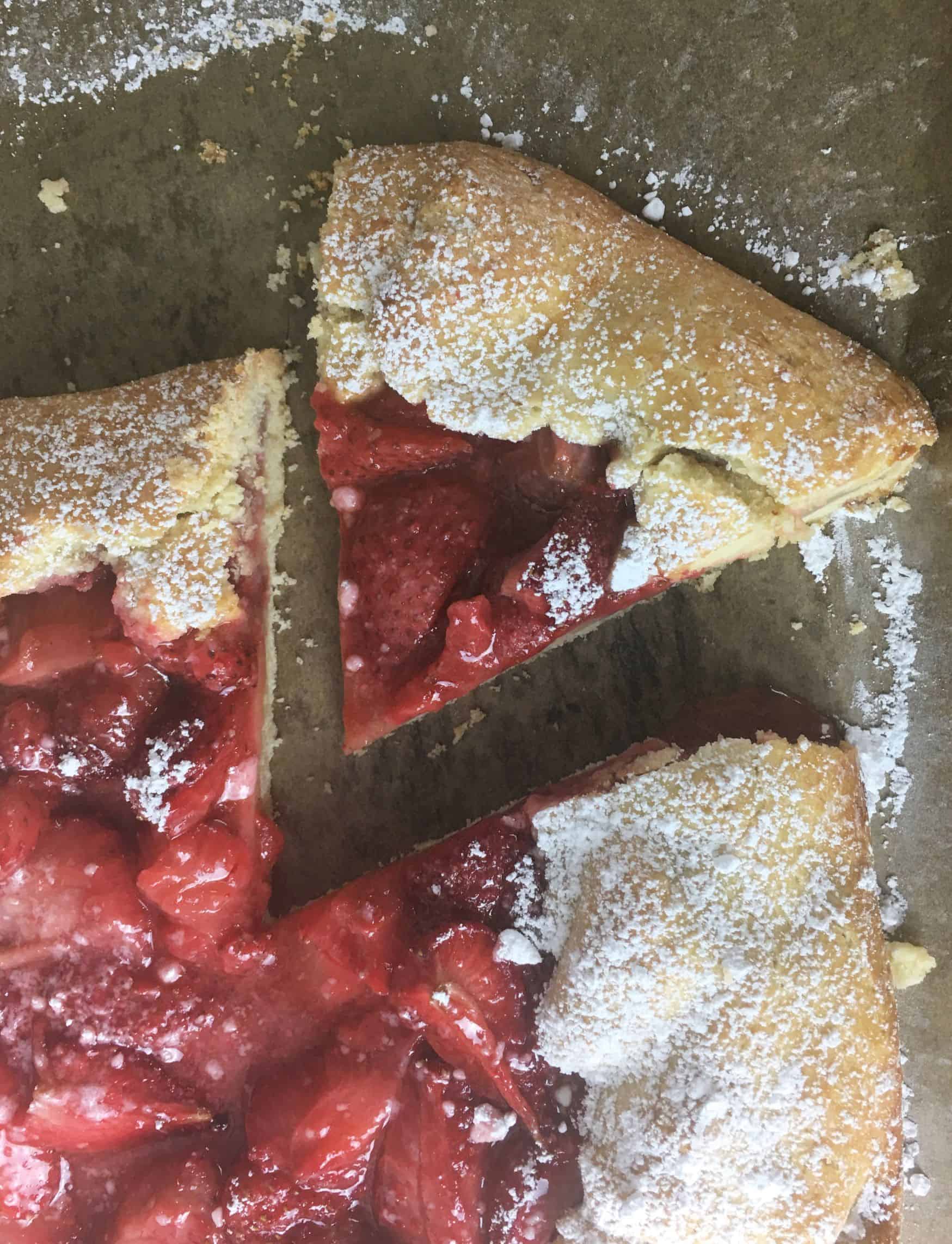 strawberry galette with cut slice.