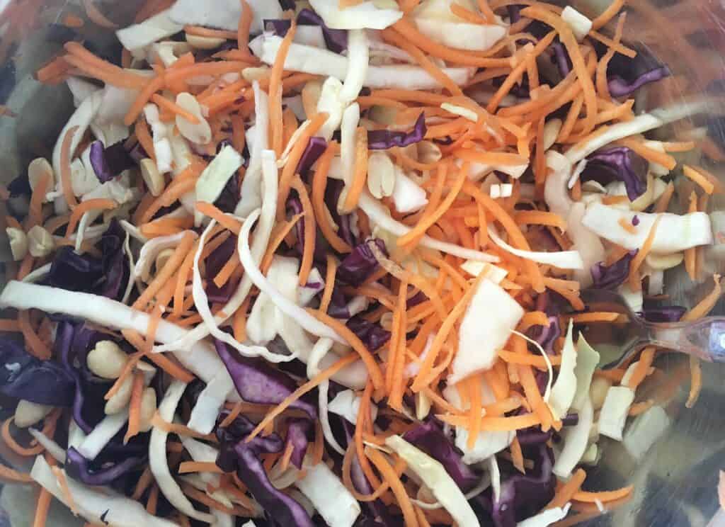 Asian coleslaw mixed in a bowl