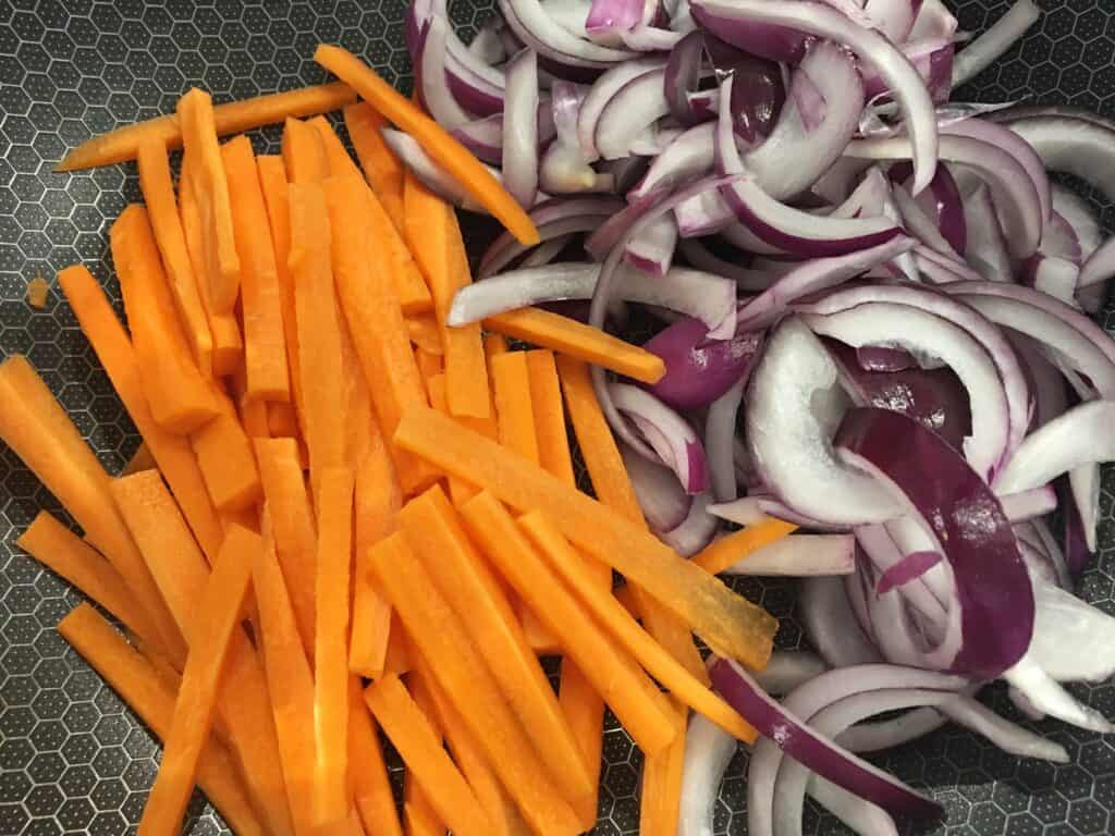 cut carrots and red onion