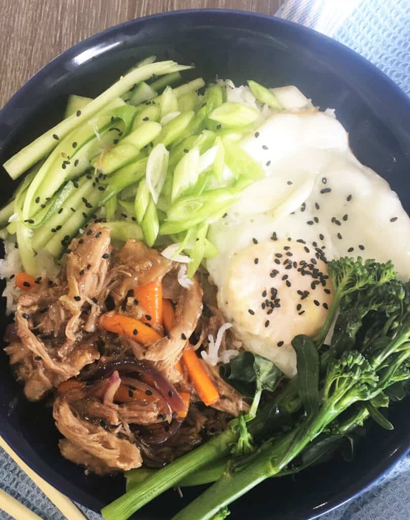 Bowl of duck with vegetables