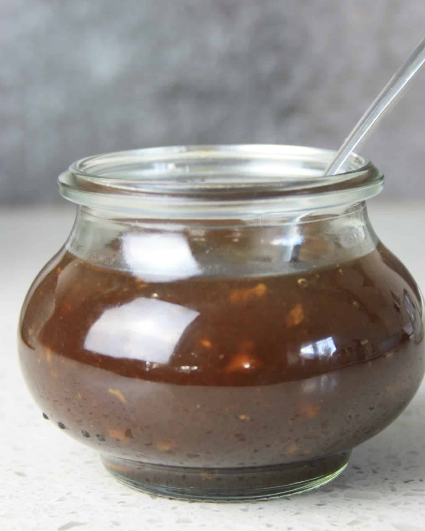 teriyaki sauce  in a small glass jar