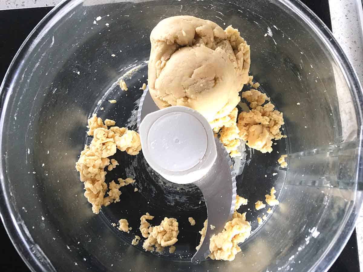 dough in a food processor bowl.