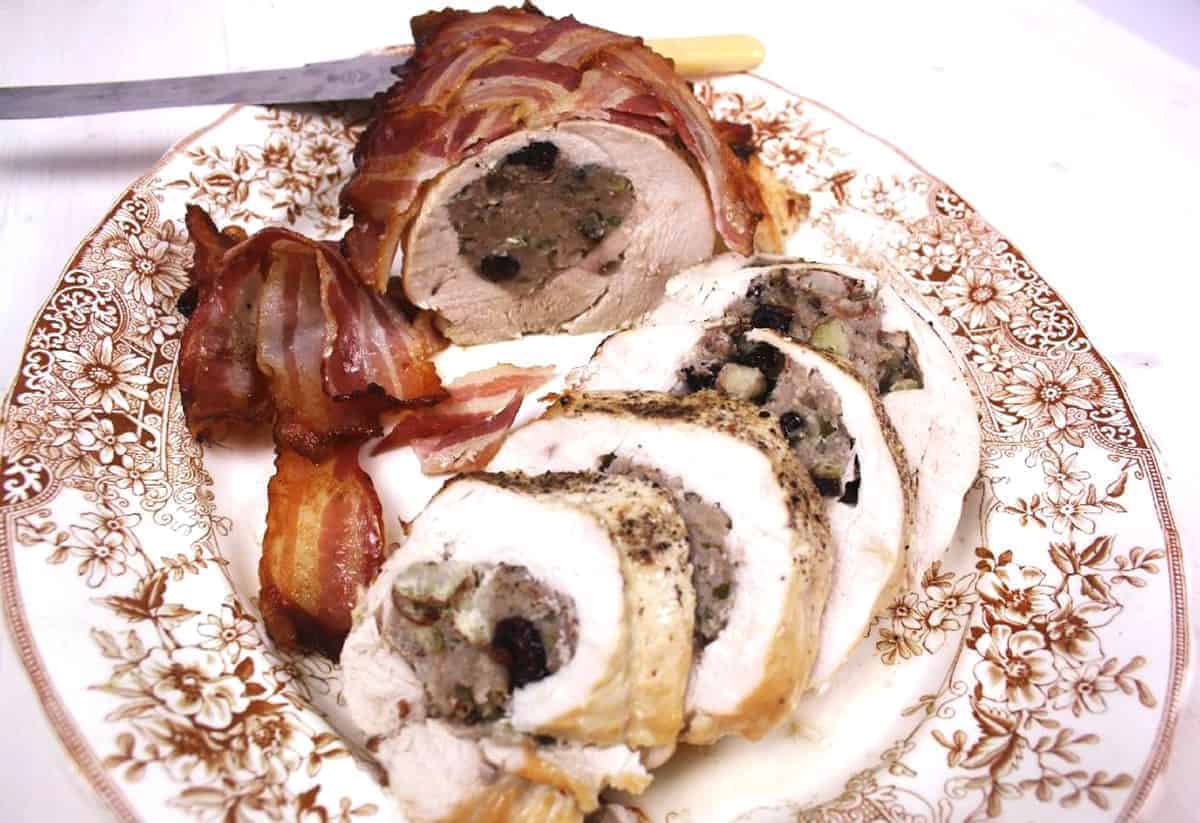 slices of turkey ballotine on a plate.