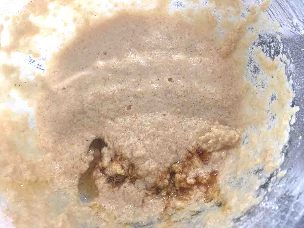 muffin mixture in a mixing bowl.