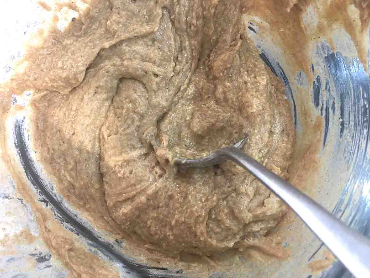 muffin mixture folded with a spoon.