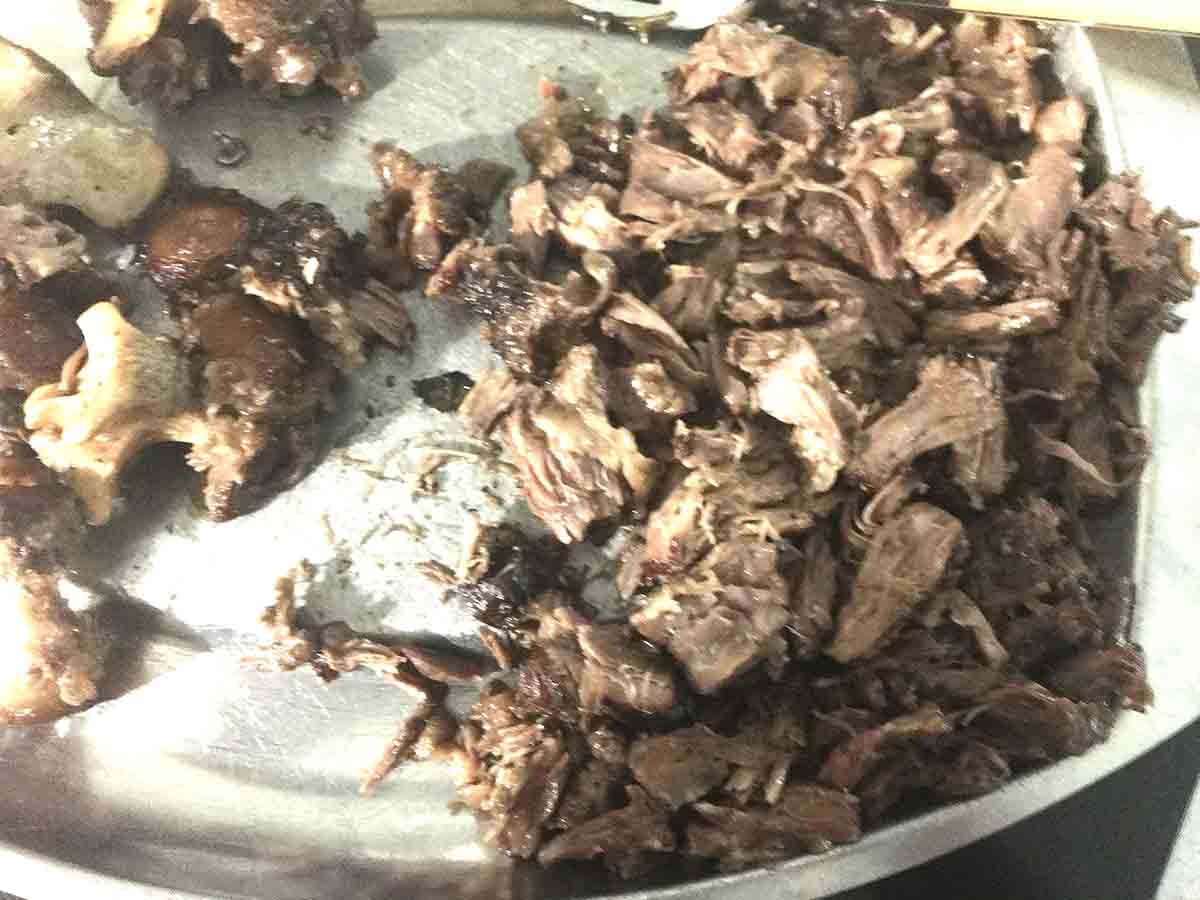 shredded meat on a try.