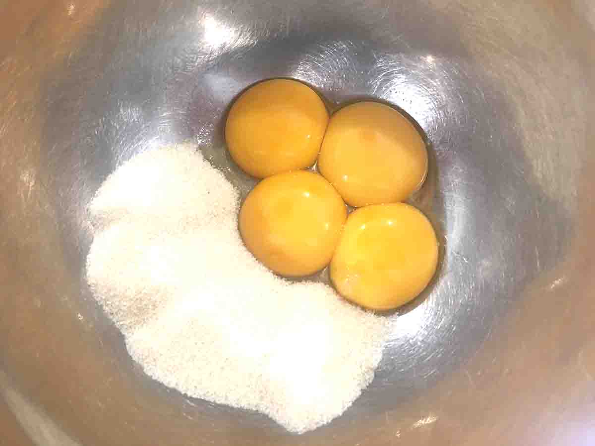 eggs and sugar in a bowl.