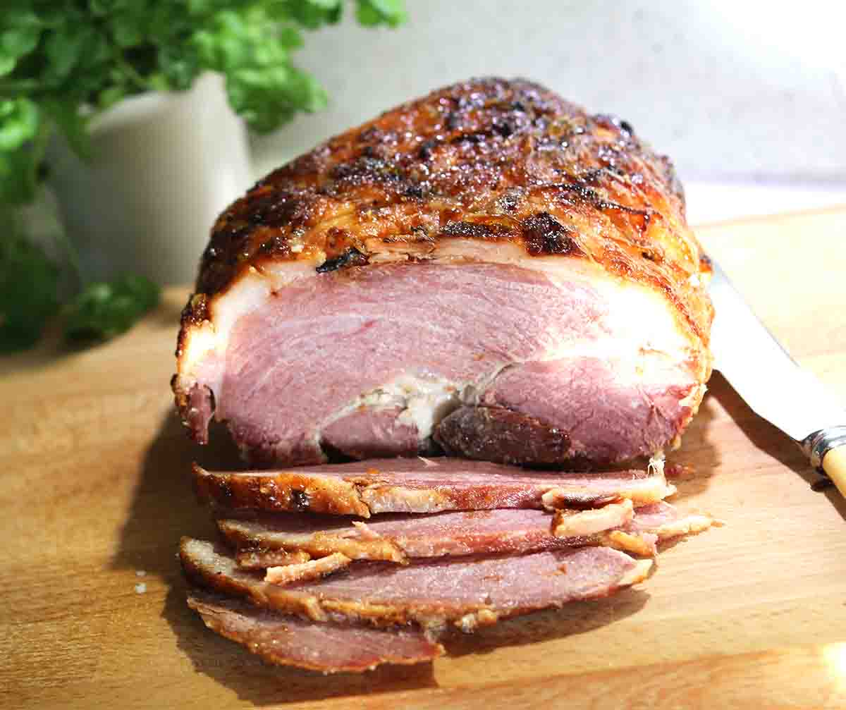 glazed gammon joint with slices cut.