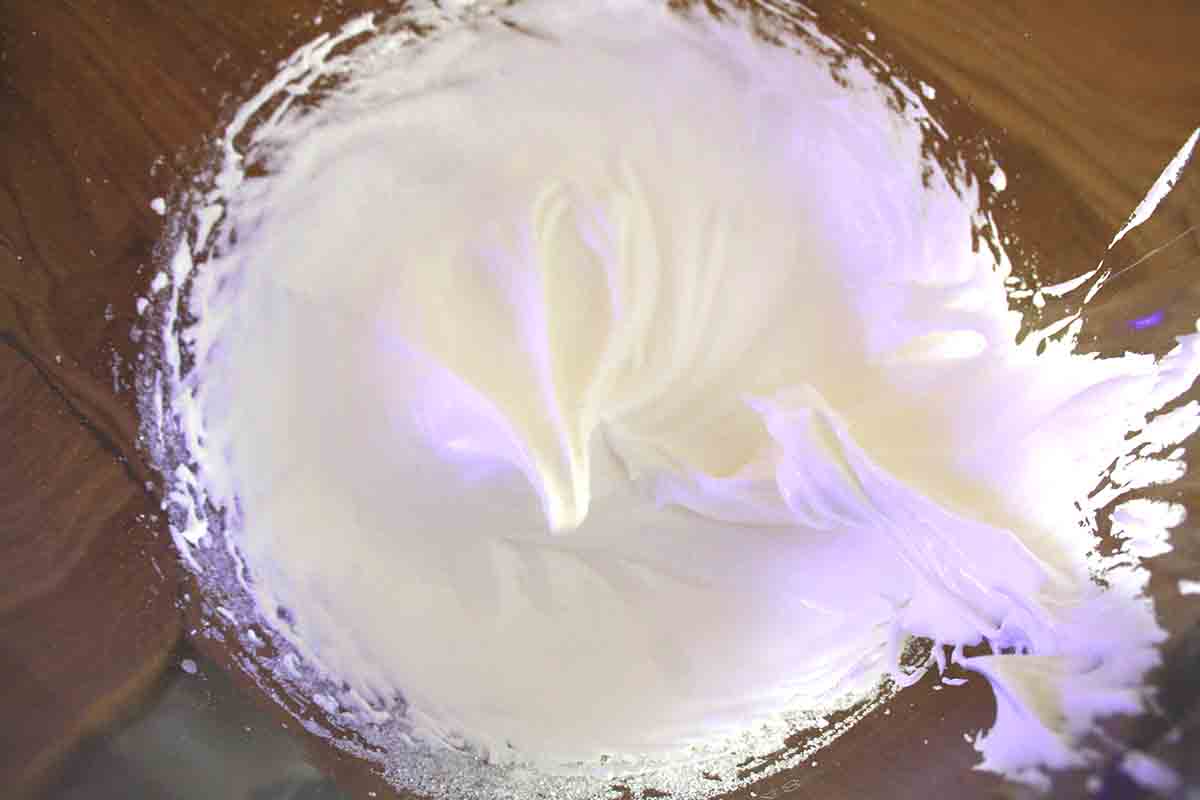 meringue whipped up in a bowl.
