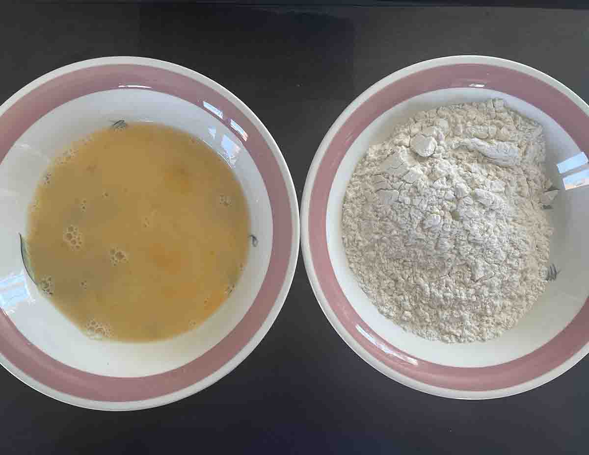 bowls of egg and flour.