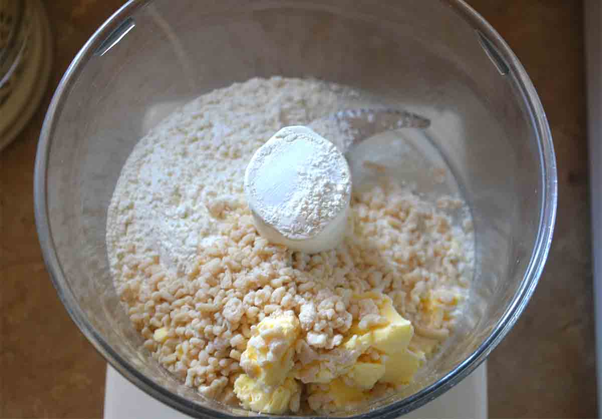 pastry ingredients in a food processor bowl.