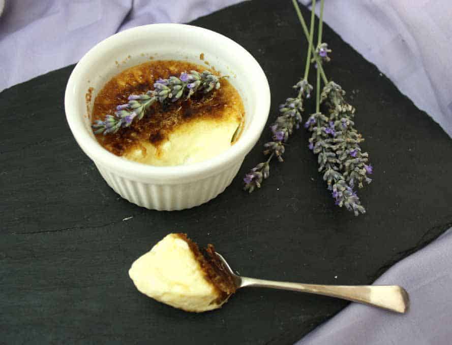 baked custard with a spoonful take out and left on the spoon.
