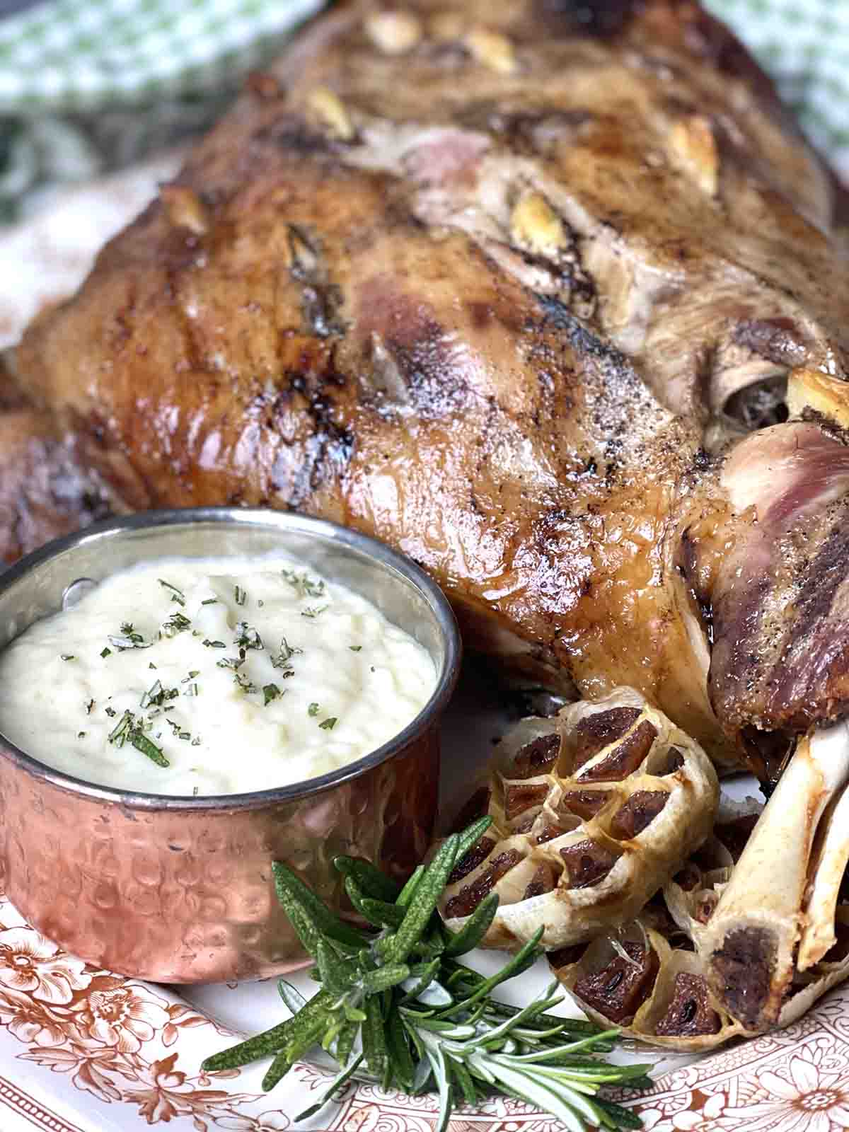 slow roast lamb shoulder and pot of onion sauce. as a main dish in Easter Menu ideas.