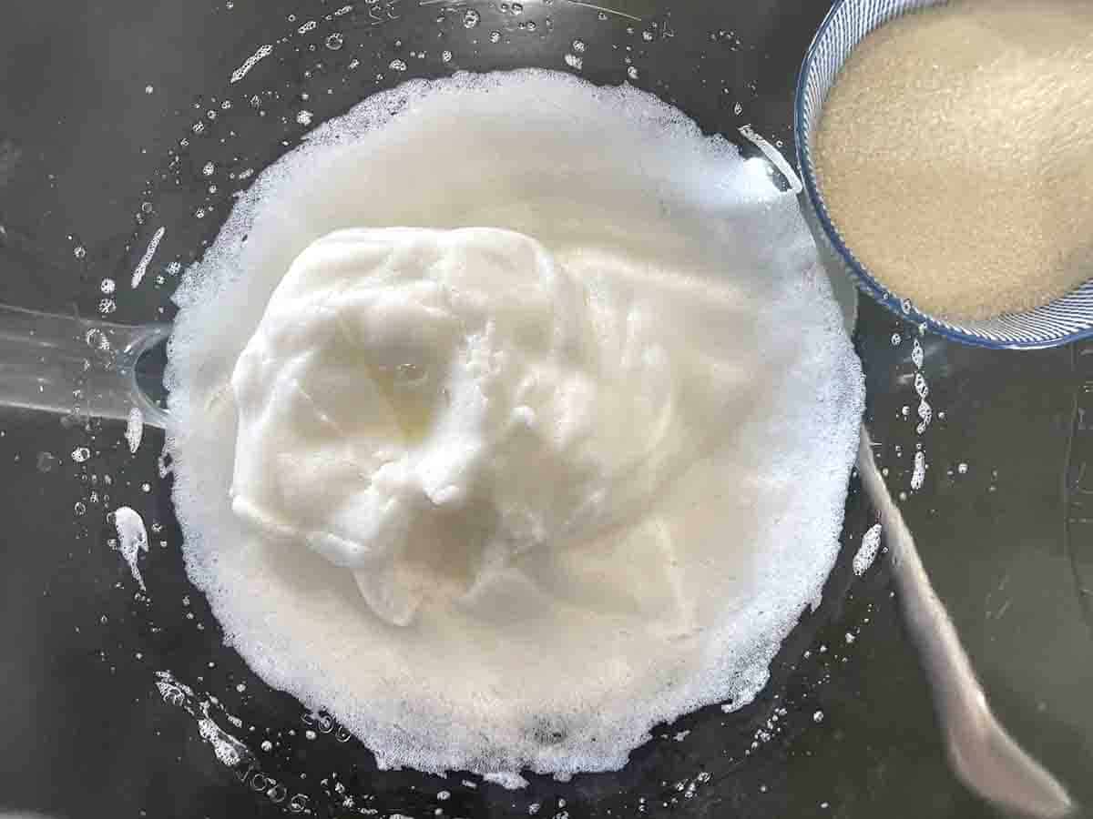 whipped egg whites in a bowl.