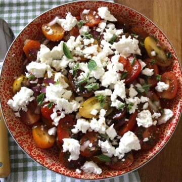 cherry tomato and feta salad in a bowl.