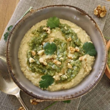 hummus with coriander pesto in a bowl.