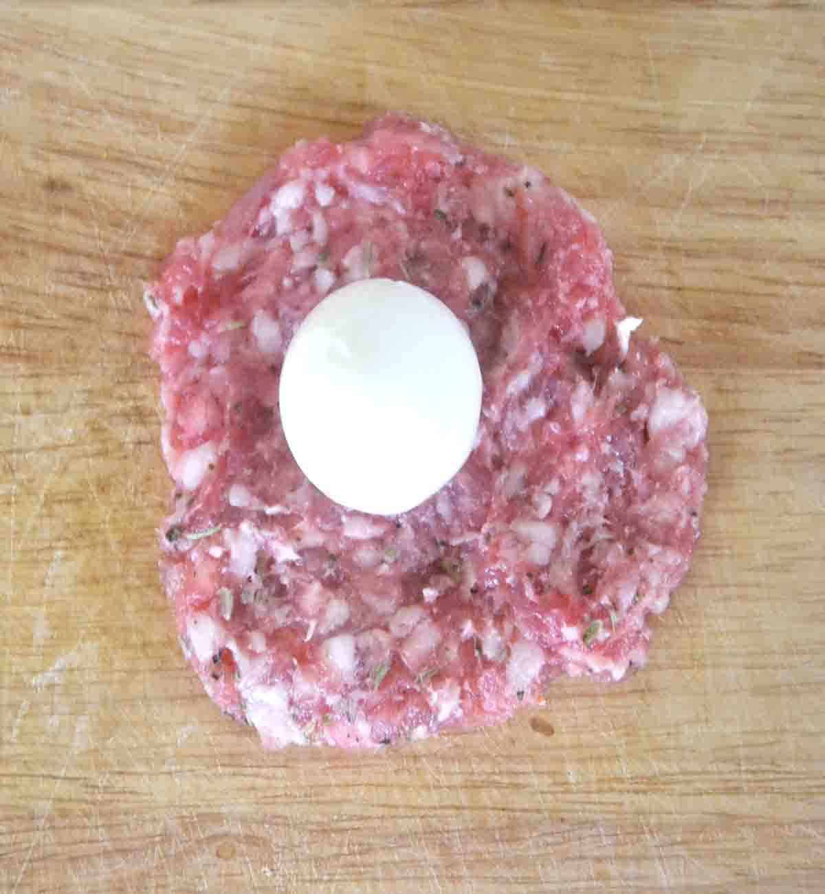 boiled egg in the centre of sausagemeat.