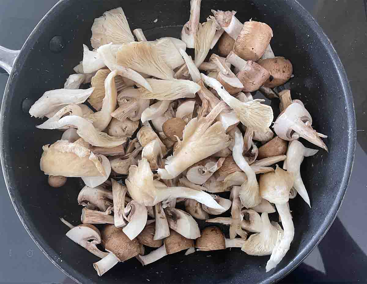 chopped mixed mushrooms ready to cook in a pan.